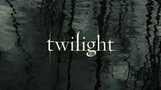 the title for twilight, which is written in white and black ink on dark water