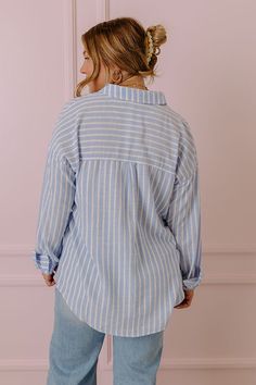 - Bring on the boss babe vibes in this must-have button up! - Lightweight, sky blue and white striped material - A collared neckline with a button up front - A single functional chest pocket - Long sleeves with button closure cuffs - A relaxed silhouette that ends in a rounded hemline Measurements S-M : Bust 40", Hip 44", Length 27.5", Sleeve Length 20.5", Waist 42". M-L : Bust 42", Hip 46", Length 28.5", Sleeve Length 20.5", Waist 44". Dont Change, The Boss, Boss Babe, Chest Pocket, Sky Blue, Blue Sky, White Stripe, Button Up, Blue And White