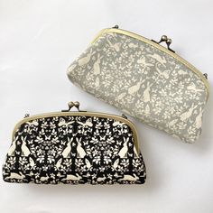 RELATED LINKS More bags & pouches from our shop. https://etsy.me/2X8S8A4 This is a long wallet with a parent-child clasp type that also has a clasp on the inside. It also has a card holder so you can fit plenty of cards in it. *The listed price is for each item only.   * Genuine leather shoulder strap sold separately. Available in two colors: black and brown. If you wish, please select from the options. It can hold a smartphone, bankbook, keys, etc., so you can go out with just this one item. It can also hold a passport, making it convenient for traveling and storing valuables. Bills can be inserted without folding. The inner purse can hold coins, keys, etc. The bottom has a 4cm gusset, so it is smaller than it looks. It has a large storage capacity. It can hold your smartphone, lipstick, Money Pouch, Clip Wallet, Coin Wallet, Earphone Case, Money Clip Wallet, One Bag, Large Storage, Coin Purses, Long Wallet