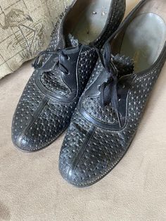 Lovely 1940’s black leather heels. In good vintage condition, one lace is shorter than the other. “Casual Classics” brand. Measures 9” tip of toe to heel. Pretty narrow, 2.75” across wide part of toes. 6.5-7 in modern size Vintage Brogue Oxfords, Vintage Brogue Oxfords With Closed Toe, Vintage Oxfords With Leather Sole, Vintage Lace-up Oxfords For Formal Occasions, Vintage Lace-up Oxfords For Formal Wear, Vintage Oxfords With Leather Sole And Closed Toe, Vintage Black Almond Toe Oxfords, Vintage Black Oxfords With Almond Toe, Vintage Oxfords With Leather Sole And Pointed Toe