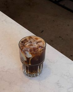 an iced drink sitting on top of a table