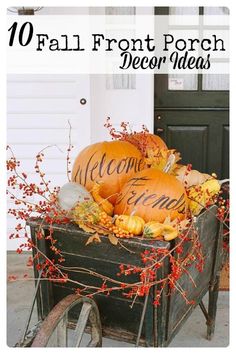 pumpkins and gourds with welcome friends written on them sitting in front of a door