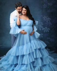 Bringing elegance to motherhood 💕 Our maternity gowns are designed to make you feel beautiful and confident during one of life's most precious moments. Blue And White Maternity Shoot, Floor-length Maternity Dress With Ruffles For Wedding, Floor-length Ruffled Maternity Dress For Wedding, Floor-length Blue Maternity Gown, Blue Floor-length Maternity Gown, Elegant Blue Maternity Gown, Wedding Maternity Dress With Ruffles, Elegant Maternity Dress With Ruffles For Wedding, Maternity Tulle Gown With Ruffles