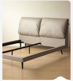 a couch that is sitting on top of a wooden floor