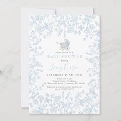 a baby shower is shown with blue flowers and a stroller in the middle, on a white background