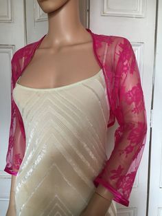 This is a beautiful hand made fuchsia/cerise pink lace shrug ideal for weddings or special occasions. The shrug has a satin edging. It can also be worn with casual wear. It can be made in any size from 8 to 24 (UK sizes). It is made in the UK. It is normally sent out to you within 5 days, but I am very happy to make your order a priority if you need it urgently. Just let me know the date needed by. Postage is free in the UK! International postage is £9. I am happy to exchange items or refund you Spring Party Shrug With Lace Trim, Fitted Party Shrug With Lace Trim, Fitted Lace Trim Shrug For Party, Fitted Lace Trim Party Shrug, Elegant Fitted Pink Shrug, Pink Shrug, Shrug Jacket, Lace Shrug, Cotton Wedding