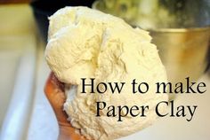 a close up of a person's hand holding a piece of paper clay with the words how to make paper clay on it