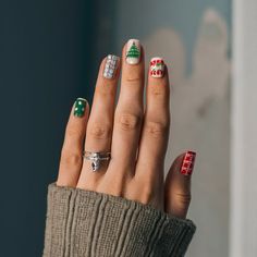 Christmas nail design ideas with a focus on festive and elegant styles Themed Nails