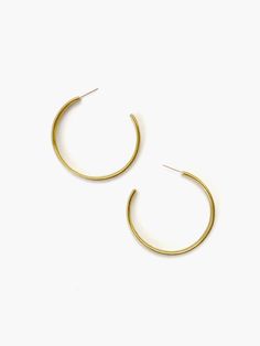 These minimal hoops feature two parts conjoined as one, echoing it’s Arabic meaning ‘unity’. Sister style in the Wahada Collection. Details: 1” long sterling silver backs solid brass Brass Jewelry, Brass Earrings, Jewelry Care, Solid Brass, Madewell, Access Denied, Nature Inspiration, Gold Bracelet, Hoop Earrings