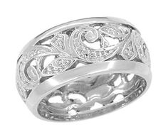 a white gold wedding ring with filigrees