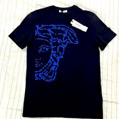 New With Tags. Designer Blue Cotton T-shirt, Blue Designer Cotton T-shirt, Luxury Blue Tops For Summer, Designer Blue Crew Neck T-shirt, Designer Blue Crew Neck Top, Designer Blue Tops With Logo Print, Designer Blue Tops For Streetwear, Luxury Blue Cotton Tops, Luxury Blue Short Sleeve Top