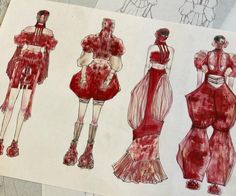 an image of fashion sketches drawn on paper