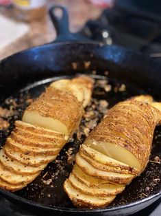 some food is being cooked in a pan on the stove top and ready to be eaten