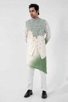 Multi color Nehru jacket with green and blue thread work, sequins embroidery and asymmetric hem. - Aza Fashions Green Nehru Jacket With Zari Work For Reception, Festive Green Nehru Jacket For Reception, Spring Green Embroidered Sherwani, Spring Embroidered Green Sherwani, Spring Green Nehru Jacket With Intricate Embroidery, Green Cotton Nehru Jacket With Resham Embroidery, Traditional Spring Kurta With Sequins, Green Embroidered Bandhgala For Spring, Embroidered Green Bandhgala For Spring