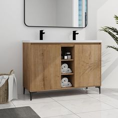 a bathroom with a wooden cabinet, mirror and towel rack on the wall next to it