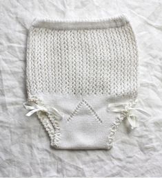 "FRENCH vintage 70's, beautiful little knitted briefs, white pure cotton knit, satin ribbons to knot. Estimated size 3 years Length 10,2\" - Waist ( taken flat without stretching the elastic ) 7,4\" Vintage condition level 5, new old stock ( washed once ). We assess the condition of our vintage items on a scale from 0 to 5. Level 5 corresponds to an almost new vintage condition. Any defects are systematically reported. Even though in very good condition, vintage items may present imperfections d Fitted White Cotton Diaper Cover, Cotton Tunic Tops, Satin Ribbons, Level 5, Vintage Clothes, Vintage Knitting, Cotton Knit, Vintage Linens, New Vintage