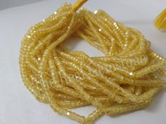 PRODUCTS DETAILS :-   Yellow Cubic Zircon 3mm Rondelle Faceted Jewelry Making Semi Precious Wholesale Gemstone Beads Strand Gemstone Name :- Yellow Cubic Zircon Bead Size :- 3mm Shape :- Rondelle Plain/ Faceted :- Faceted Length :- 13 Inches Quality Grade :- AAA (Excellent) Treatment :- Natural Image Contains :- 1 Bunch of more than 50 Strands Package Contains :- 1 Strand We Have More Types Colors and Style Many Strands Quantity Beads & Necklaces Our Shop. Visit The links below for a variety of More Cubic Zirconia Necklaces Hooks :- https://www.etsy.com/in-en/shop/TEHREALGEMSTONES?ref=seller-platform-mcnav&section_id=27136325 WE ACCEPT ALL KIND OF CUSTOM ORDERS AND PLEASE CONTACT FOR WHOLESALE PRICES. Do View Our SHOP For More FINE Gemstones:- https://www.etsy.com/in-en/shop/THEREALGEMSTON Gemstone Beads Wholesale, Gemstone Beads Jewelry, Necklace Beads, Cubic Zirconia Necklace, Semi Precious Jewelry, Zircon Jewelry, Cubic Zirconia Jewelry, Wholesale Beads, Faceted Gemstones