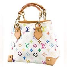 Multicolore Audra Bag Height: 8” Width: 10.5” Type Of Material: Monogram Multicolore Canvas, Leather Color: White, Multi Origin: France Top Handle Bag From The 2006 Collection Vintage White Multicolore Monogram Pattern Brass Hardware Flat Handles Alcantara Lining & Single Interior Pocket Open Top Fresh And Artistic, Louis Vuitton Remains One Of The World's Most Coveted Symbols Of Status And Sophistication. The Damier Pattern Was Designed In 1888 And The Monogram, In 1896. Over A Hundred Years La White Monogram Canvas Shoulder Bag With Branded Hardware, White Monogram Canvas Shopping Bag, White Monogram Canvas Shoulder Bag With Double Handle, White Monogram Canvas Bag With Detachable Handle, White Monogram Canvas Satchel Bag, White Monogram Canvas Bag With Removable Pouch, White Monogram Canvas Bag For Everyday, White Monogram Canvas Bags For Everyday Use, White Monogram Canvas Tote Bag