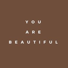 the words you are beautiful on a brown background