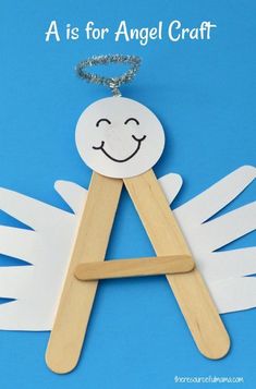 a is for angel craft made out of popsicle sticks and glue on a blue background