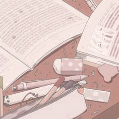 an open book sitting on top of a table next to pens and pencils with writing utensils