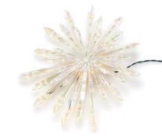 a light up snowflake on a white background with some wires attached to it