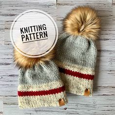 two knitted hats with fur pom - poms