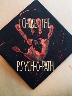 a graduation cap with the words i chose the psych - o - path painted on it