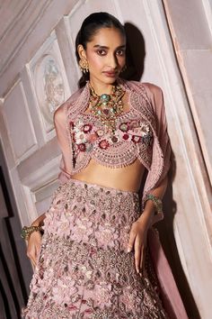 Blush pink attached cancan lehenga with floral applique, pearl, cutdana, sequin embellishment. Paired with floral embellished padded blouse and scallop border embellished dupatta. - Aza Fashions Pink Organza Party Wear Pre-draped Saree, Pink Kundan Saree, Pink Kundan Traditional Wear For Reception, Pink Kundan Sets With Cutdana, Designer Pink Lehenga With Sheer Dupatta, Pink Kundan Anarkali Set For Designer Wear, Pink Sharara For Navratri, Traditional Pink Palazzo Set For Reception, Pink Organza Lehenga With Cutdana