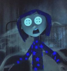 an animated doll with blue hair and stars on it's body in the dark