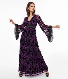 A charming maxi silhouette crafted in a smooth and lightweight purple woven fabric that dances with a black velvet burnout print of Maleficent from Sleeping Beauty. Outfitted with three-quarter length sleeves that dance with ruffled chiffon-style fabric while a back zipper nips in the empire waist. Empire Waist Maxi, Purple Weave, Chiffon Style, Empire Waist Maxi Dress, Velvet Burnout, Chiffon Fashion, Vintage Long Sleeve