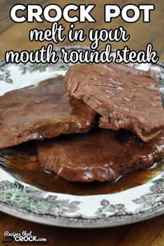 two pieces of chocolate on a plate with the words crock pot melt in your mouth round steak