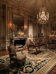 an ornately decorated living room with chandelier