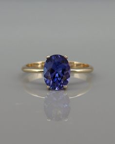 The perfect gift for Women! Classy Handmade jewelry by Averie! Shop for this astonishing solitaire ring handmade of solid 14k yellow gold and set with natural Tanzanite gemstone. A remarkable and bold oval cut ring that can be fabulous also as engagement ring for women. A dainty Tanzanite ring, no one can ignore. If you are looking for something exceptional, this ring is for you! Tanzanite Engagement Ring, December Birthstone Ring, Aqua Aura, Gold Solitaire Ring, Sapphire Solitaire, Tanzanite Ring, Gemstone Jewelry Handmade, Silver Engagement Rings, December Birthstone