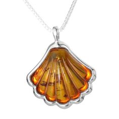 This is a wonderful pendant, ideal if you are looking for something a little different. This pendant is set with genuine carved amber. The large piece of amber measures 21 x 26 mm (including bale). and comes with a lovely 18 inch chain.See my shop for matching earrings and other amber items:https://www.etsy.com/uk/shop/gotcharm Amber Pendant Necklace In Baltic Amber, Baltic Amber Pendant Necklace, Handmade Baltic Amber Pendant Necklace, Gold Pendant Necklace With Baltic Amber, Handmade Yellow Baltic Amber Necklaces, Baltic Amber Necklace With Round Pendant, Handmade Baltic Amber Necklace In Yellow, Round Baltic Amber Pendant Necklace, Handmade Yellow Baltic Amber Necklace