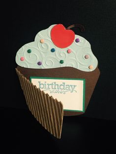 a cupcake shaped birthday card with a heart on top