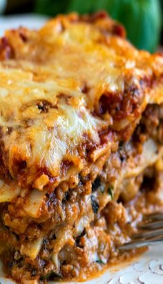 lasagna casserole on a plate with a fork