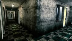 an empty hallway with tiled floors and walls