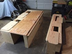 two pieces of wood sitting next to each other in a garage