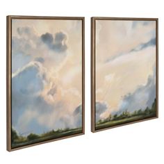 two framed paintings with clouds in the sky and trees on one side, against a white background