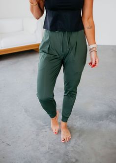 These silky jogger pants feature an adjustable drawstring waistband, inseam pockets, front pleats, and cuffed hems. Trinity and Laurie are wearing size smalls. Measurements: Rise: 13" | Inseam: 27" Small: Waist: 29" Medium: Waist: 30" Large: Waist: 32" 77% Nylon 23% Lycra Curvy Dress, Drawstring Waistband, Jogger Pants, Bralette, Short Dresses, Graphic Tees, Maxi Dress, Pants, How To Wear