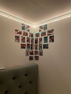 a room with pictures and lights on the wall