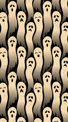 a group of ghost faces with eyes drawn on them