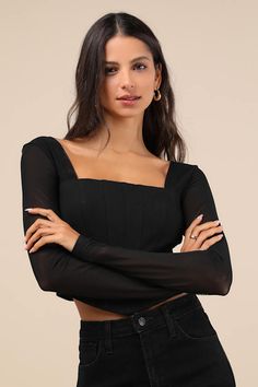 The Lulus Captivating Sense Black Mesh Long Sleeve Bustier Crop Top is exactly what you need to complete your best night-out looks! Stretchy ponte knit shapes this flirty top with a square neckline framed by long, sheer mesh sleeves. The fitted bodice features bustier-style seaming, ending at a rounded, cropped hem. An exposed silver zipper (and hidden clasp) at the back completes the look! Fit: This garment fits true to size. Length: Size medium measures 18" from shoulder to hem. Bust: Great fo Fitted Square Neck Crop Top For Night Out, Fitted Flirty Crop Top, Flirty Fitted Crop Top For Evening, Flirty Fitted Crop Top For Fall, Flirty Fitted Fall Crop Top, Fitted Square Neck Crop Top, Fitted Cropped Top For Date Night, Flirty Fitted Top With Square Neck, Black Square Neck Top For Party