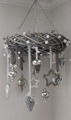 a chandelier with ornaments hanging from it's sides and the words save