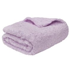 a purple blanket is folded up on a white background