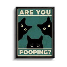 a poster with two black cats and the words are you pooping? on it