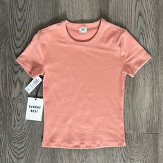 Brand: Sunday Best From Aritzia Size: Xxs Color: Heirloom Pink Condition: New With Tags Pink Ribbed Crew Neck T-shirt, Pink Ribbed Cotton T-shirt, Pink Ribbed Fitted T-shirt, Spring Ribbed Relaxed Fit T-shirt, Pink Fitted Ribbed T-shirt, Ribbed T-shirt With Relaxed Fit For Spring, Fitted Ribbed Pink T-shirt, Fitted Pink Ribbed T-shirt, Dance Christmas