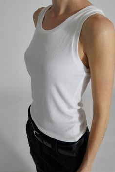 Elevate your everyday style with the Soren Ribbed Viscose Stretch Tank Top. Crafted from a luxurious blend of Italian made fibers, this tank top offers a soft, ribbed texture that adds a touch of sophistication to your look. Designed for comfort and versatility, it provides a stretch fit and an elevated feel that sets it apart from typical lounge-wear. Whether you're running errands, meeting friends, or enjoying some downtime, this tank top combines comfort and style effortlessly, ensuring you l Essential Wardrobe, Tuxedo Pants, Meeting Friends, Meet Friends, Stretch Top, Ribbed Texture, Cotton Viscose, Everyday Wardrobe, Everyday Style