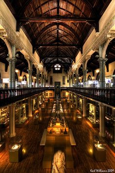 the inside of a museum with many displays